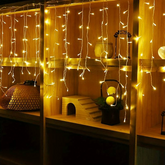 Χριστουγεννιάτικα Λαμπάκια Κουρτίνα 100 LED Θερμό Χρώμα με Διαφανές Καλώδιο 3m 40x50x60cm